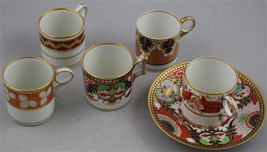 Five Worcester gilt and polychrome porcelain coffee cans and a saucer, c.1800-1820, coffee can 6.3cm, saucer 14.7cm